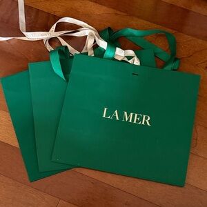 La Mer Green Paper Bags with Gold Logo
